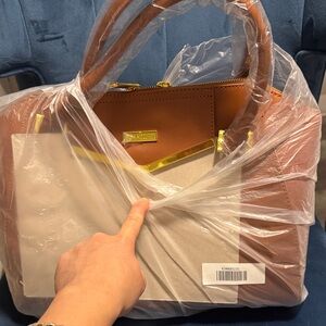 Stylish Tan Satchel with Gold Accents